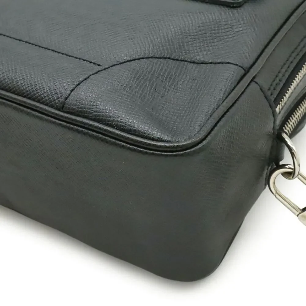 Louis Vuitton Taiga Pavel Clutch